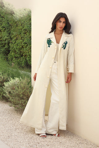 The Language Of Flowers S.FO4 -elegant ivory stripe abaya featuring a refined striped fabric beautifully enhanced with delicate floral patches on the front.