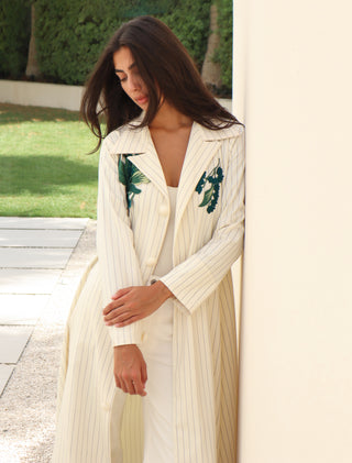 The Language Of Flowers S.FO4 -elegant ivory stripe abaya featuring a refined striped fabric beautifully enhanced with delicate floral patches on the front.