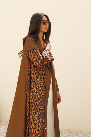 The Language Of Flowers S.FO6 - sophisticated brown abaya featuring a rich printed statement panel that adds a distinctive touch to the design. 