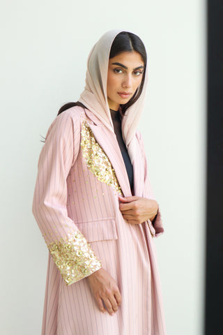 shimmer-The Art Of Layers S.LO5 - an elegant pink pinstripe abaya adorned with delicate gold sequin detailing for a refined touch of glamour.