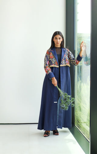 shimmer-The Art of Layers S.LO6 - a striking navy floral abaya featuring beautifully printed sleeves accented with delicate fringe details.